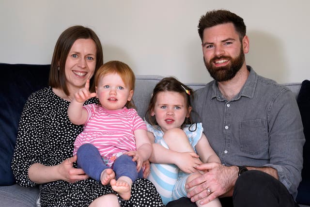 <p>Opal Sandy (second left) was born completely deaf because of a rare genetic condition</p>