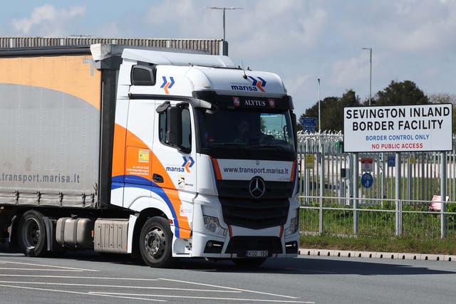 <p>A truck leaves the inland border facility at Sevington, near Ashford, Kent </p>