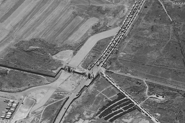 <p>File. Dozens of trucks line the highway that leads to the Rafah crossing from Egypt</p>