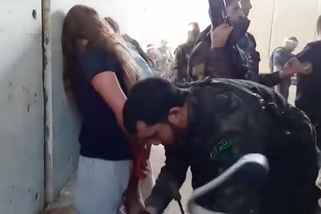<p>The video shows the capture of seven Israeli female soldiers from the Nahal Oz military base, near the northern Gaza Strip, on 7 October 2023 </p>